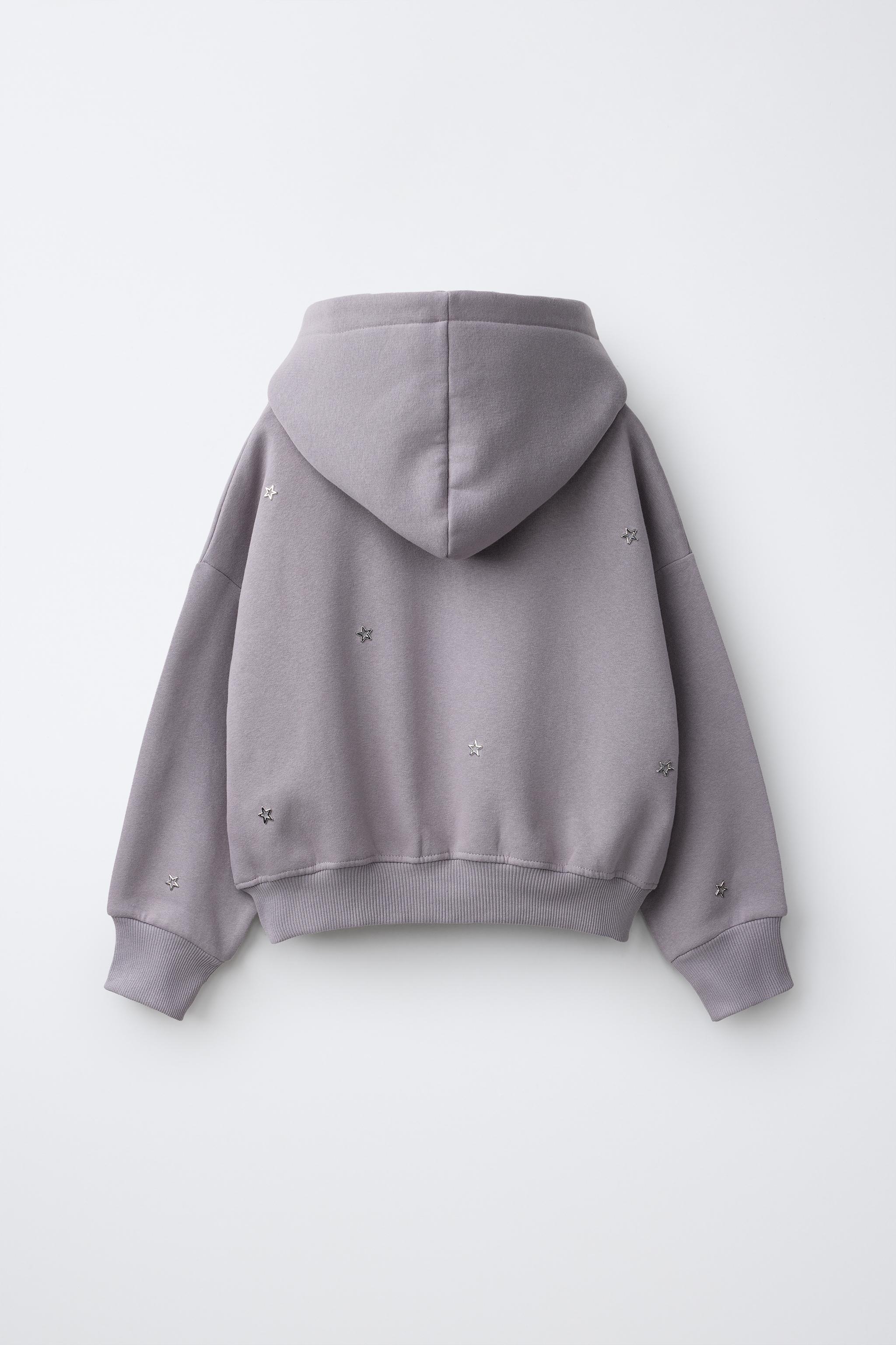 SWEAT À CAPUCHE CLOUS ÉTOILES